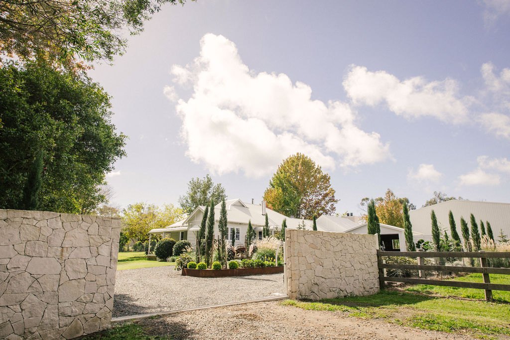 Cypress-lined entry